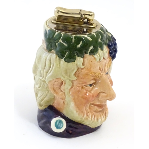 134 - An unusual Royal Doulton Bacchus character jug with Colibri table lighter to top. Approx. 4 1/2