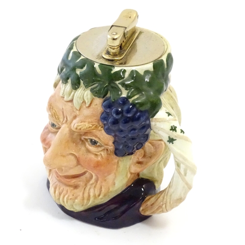 134 - An unusual Royal Doulton Bacchus character jug with Colibri table lighter to top. Approx. 4 1/2