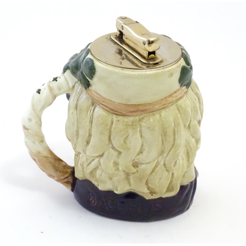 134 - An unusual Royal Doulton Bacchus character jug with Colibri table lighter to top. Approx. 4 1/2