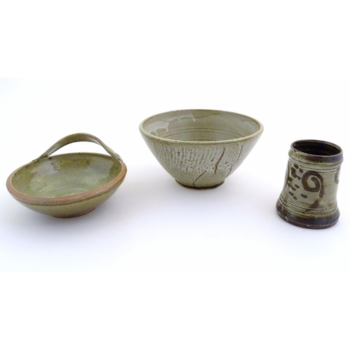 170 - Three assorted studio pottery items to include a bowl with an applied single handle, inscribed under... 