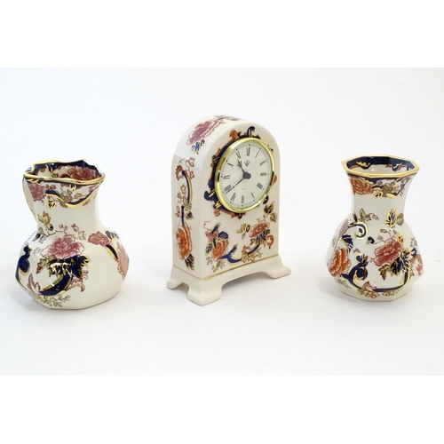 180 - Three Mason's ironstone items in the pattern Mandalay to include a mantel clock, a jug and a vase. E... 