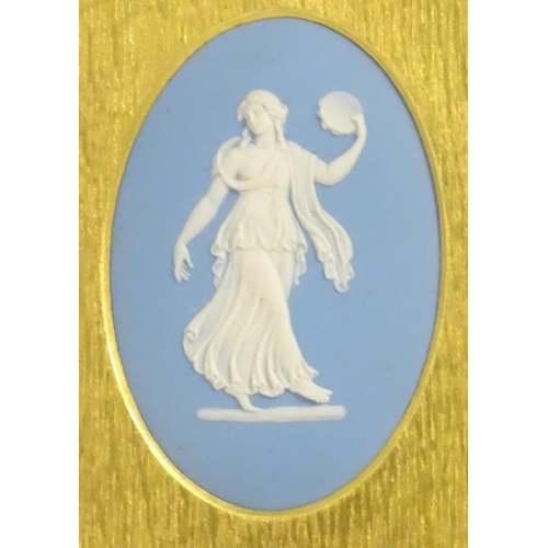 188 - A pair of 19thC Wedgwood jasperware blue and white oval plaques depicting classical maidens, one wit... 