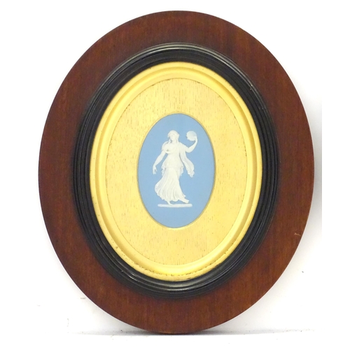 188 - A pair of 19thC Wedgwood jasperware blue and white oval plaques depicting classical maidens, one wit... 