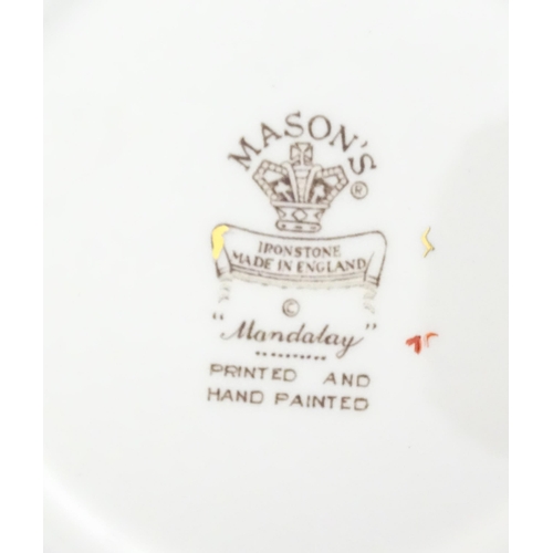 212 - A large quantity of Mason's ironstone tea wares in the Mandalay pattern to include lamp base, wall c... 