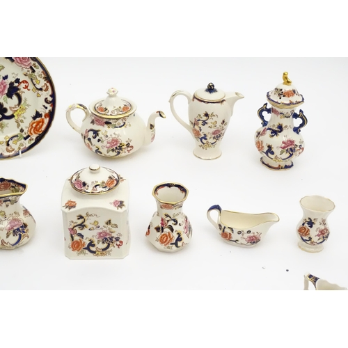 212 - A large quantity of Mason's ironstone tea wares in the Mandalay pattern to include lamp base, wall c... 