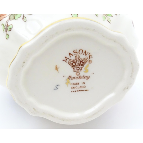 212 - A large quantity of Mason's ironstone tea wares in the Mandalay pattern to include lamp base, wall c... 