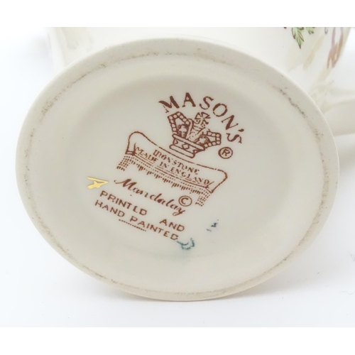 212 - A large quantity of Mason's ironstone tea wares in the Mandalay pattern to include lamp base, wall c... 