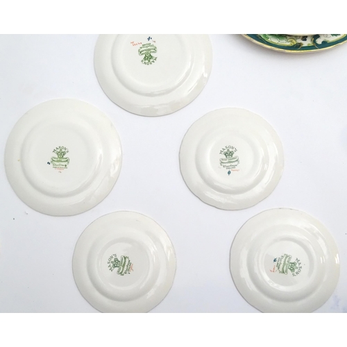 216 - A quantity of Mason's dinner wares in the pattern Chartreuse, to include chambersticks, plates, side... 