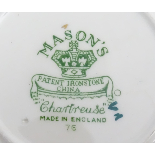 216 - A quantity of Mason's dinner wares in the pattern Chartreuse, to include chambersticks, plates, side... 