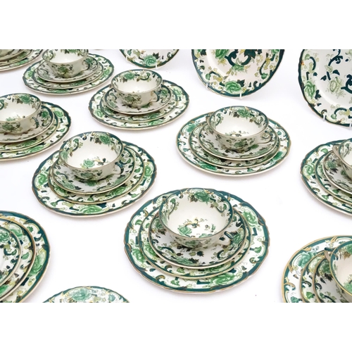 216 - A quantity of Mason's dinner wares in the pattern Chartreuse, to include chambersticks, plates, side... 