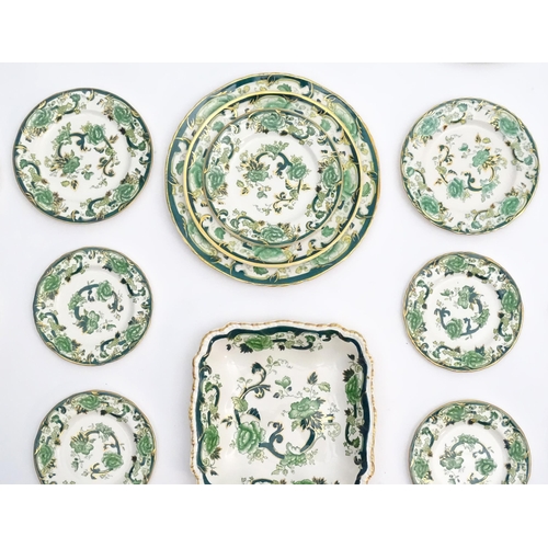 216 - A quantity of Mason's dinner wares in the pattern Chartreuse, to include chambersticks, plates, side... 