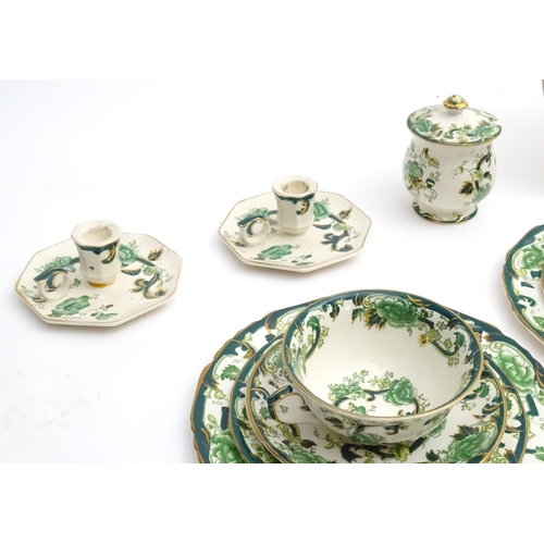 216 - A quantity of Mason's dinner wares in the pattern Chartreuse, to include chambersticks, plates, side... 