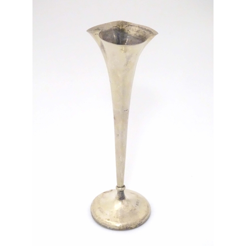 397 - A silver bud vase of fluted form, hallmarked Birmingham 1900. Approx. 8