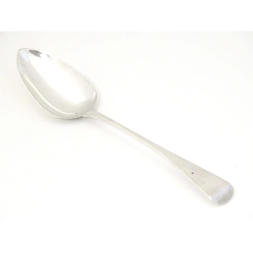 426 - A George III silver Old English pattern table spoon, hallmarked London 1811, maker John Lambe. Appro... 