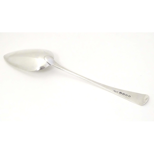 426 - A George III silver Old English pattern table spoon, hallmarked London 1811, maker John Lambe. Appro... 