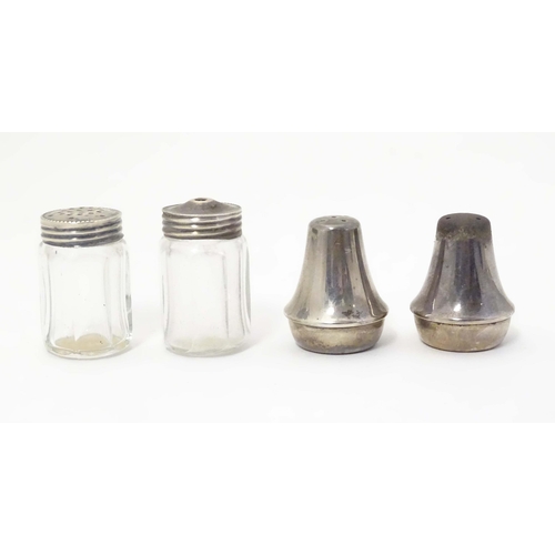 474 - A cut glass salt and pepper pots with silver tops, together with two Mexican silver small salt and p... 