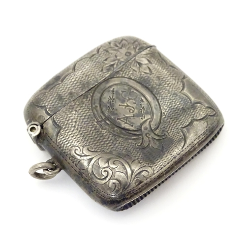 477 - A silver vesta case with engraved decoration hallmarked Birmingham 1904, maker William J. Holmes. Ap... 