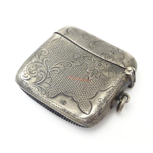 477 - A silver vesta case with engraved decoration hallmarked Birmingham 1904, maker William J. Holmes. Ap... 