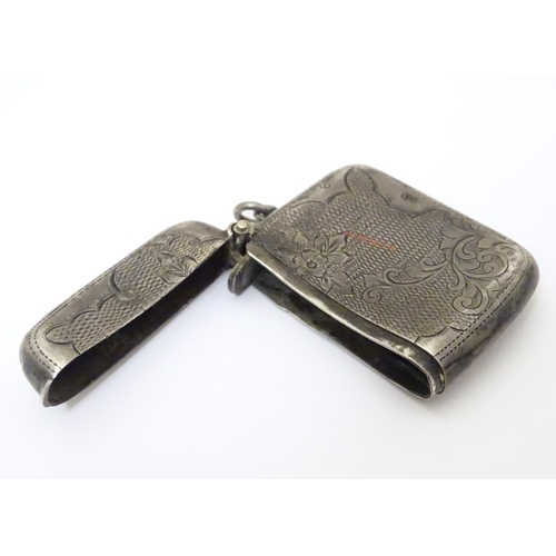 477 - A silver vesta case with engraved decoration hallmarked Birmingham 1904, maker William J. Holmes. Ap... 