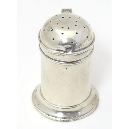 483 - A silver pepper formed as a flour shaker with loop handle. Hallmarked Birmingham 1901 maker Thomas D... 