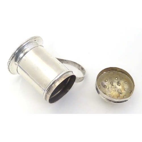 483 - A silver pepper formed as a flour shaker with loop handle. Hallmarked Birmingham 1901 maker Thomas D... 