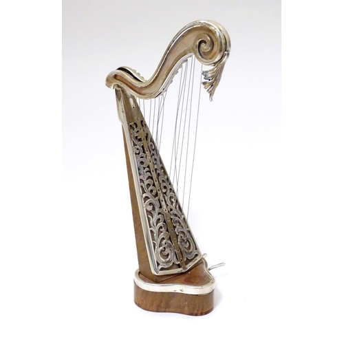 485 - A silver model of a harp by Sachetti . Approx. 5