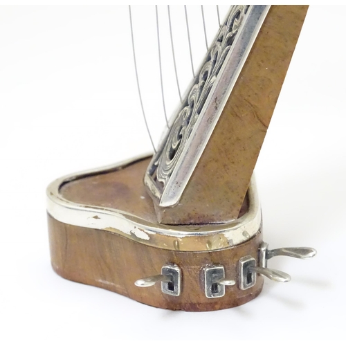 485 - A silver model of a harp by Sachetti . Approx. 5