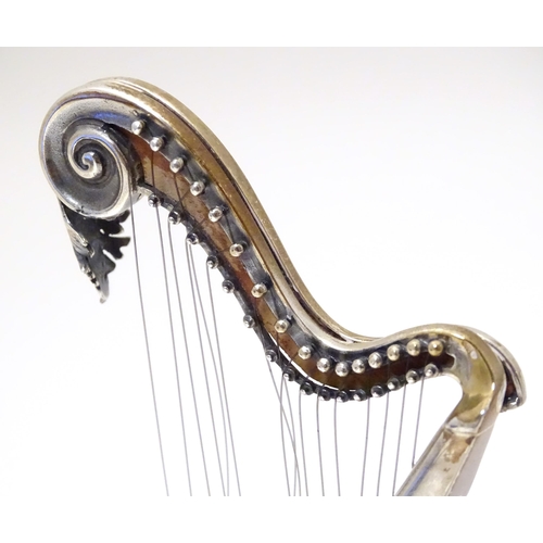 485 - A silver model of a harp by Sachetti . Approx. 5