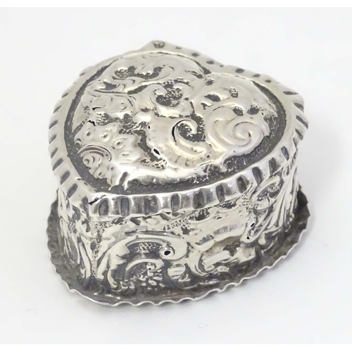 486 - A Victorian silver pill box of heart shape hallmarked Birmingham 1892. 1 1/2