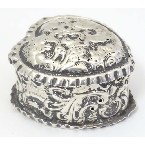 486 - A Victorian silver pill box of heart shape hallmarked Birmingham 1892. 1 1/2