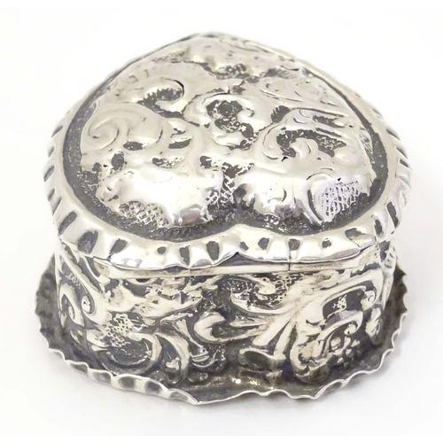 486 - A Victorian silver pill box of heart shape hallmarked Birmingham 1892. 1 1/2