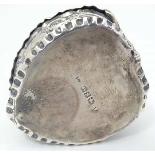 486 - A Victorian silver pill box of heart shape hallmarked Birmingham 1892. 1 1/2