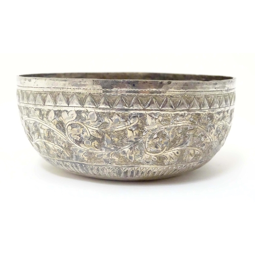 491 - A white metal bowl with acanthus scroll detail, possibly Indian. Approx. 4 1/2