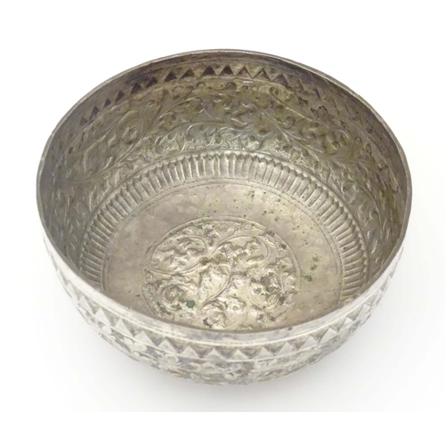 491 - A white metal bowl with acanthus scroll detail, possibly Indian. Approx. 4 1/2