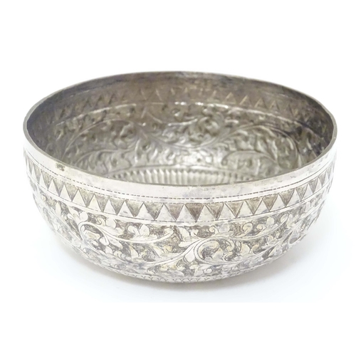 491 - A white metal bowl with acanthus scroll detail, possibly Indian. Approx. 4 1/2