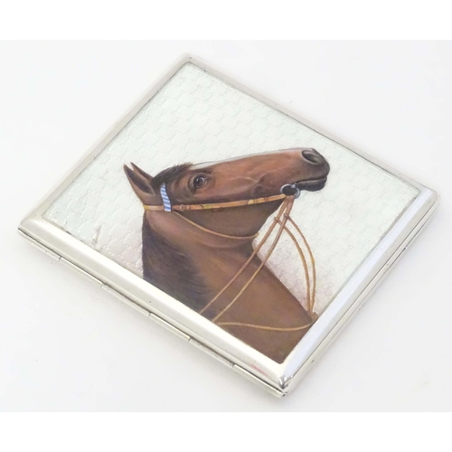 508 - A Continental .900 silver cigarette case with horse head enamel detail. marked 900 and Indistinct ma... 