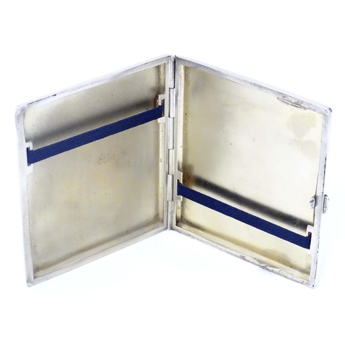 508 - A Continental .900 silver cigarette case with horse head enamel detail. marked 900 and Indistinct ma... 