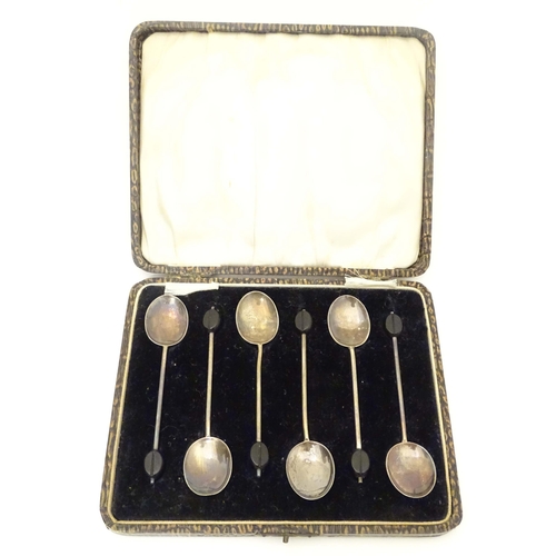 546 - A set of six silver coffee bean spoons, hallmarked Birmingham 1927 maker William Suckling Ltd. Cased... 