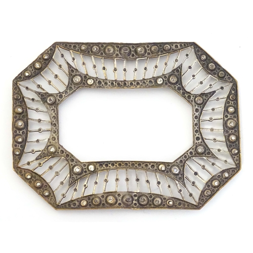 651 - A Victorina gilt metal buckle surround with marcasite decoration. Approx. 2 3/4