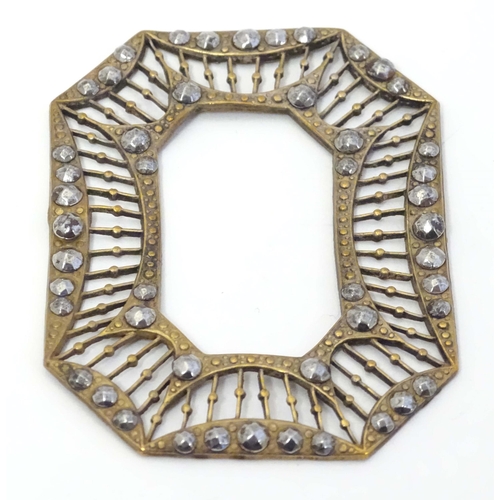 651 - A Victorina gilt metal buckle surround with marcasite decoration. Approx. 2 3/4