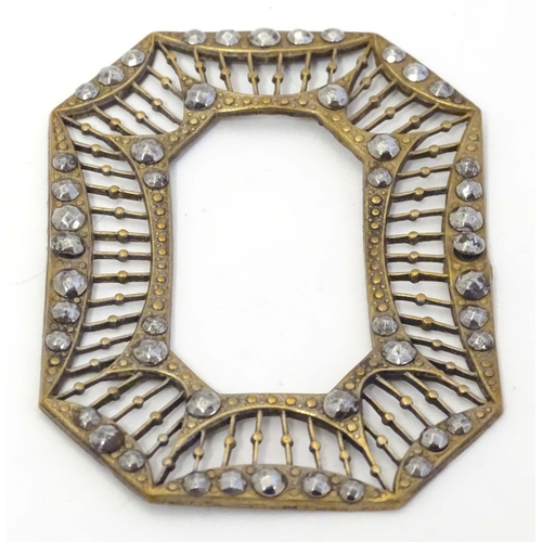 651 - A Victorina gilt metal buckle surround with marcasite decoration. Approx. 2 3/4