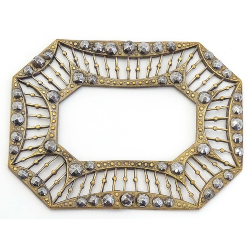 651 - A Victorina gilt metal buckle surround with marcasite decoration. Approx. 2 3/4