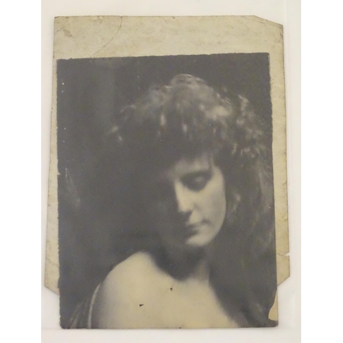 966 - A quantity of late 19th / early 20thC photographs, prints, and postcards depicting portraits, erotic... 