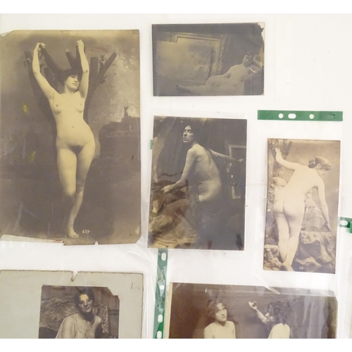 966 - A quantity of late 19th / early 20thC photographs, prints, and postcards depicting portraits, erotic... 