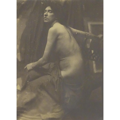 966 - A quantity of late 19th / early 20thC photographs, prints, and postcards depicting portraits, erotic... 