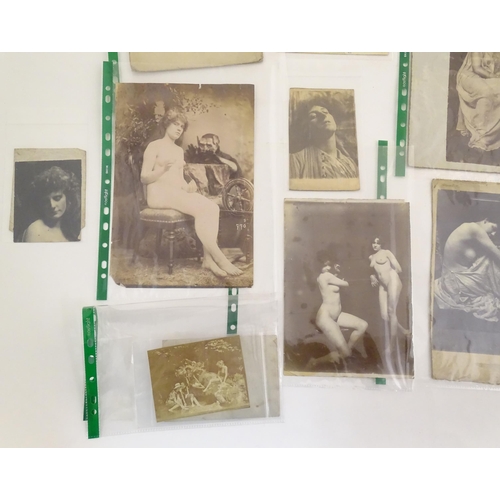 966 - A quantity of late 19th / early 20thC photographs, prints, and postcards depicting portraits, erotic... 