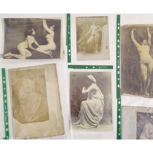 966 - A quantity of late 19th / early 20thC photographs, prints, and postcards depicting portraits, erotic... 