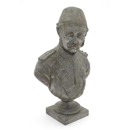 979 - A late 19th / early 20thC cast bust of British General Gordon Pasha (1833-1855) with various badges ... 