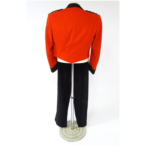 994 - Militaria: a mid to late 20thC British Army Colonel's no.10 mess dress uniform, comprising short jac... 