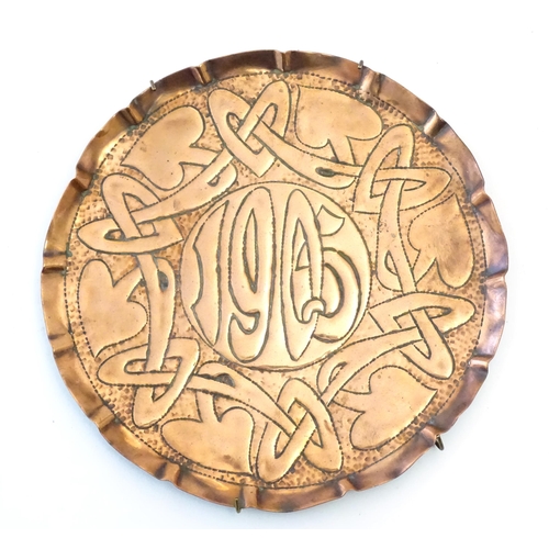 997 - An Art Nouveau copper card tray with embossed decoration depicting stylised flowers and foliage, dat... 